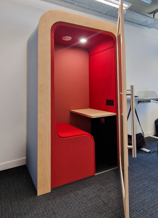 Single office pod in modern office setting